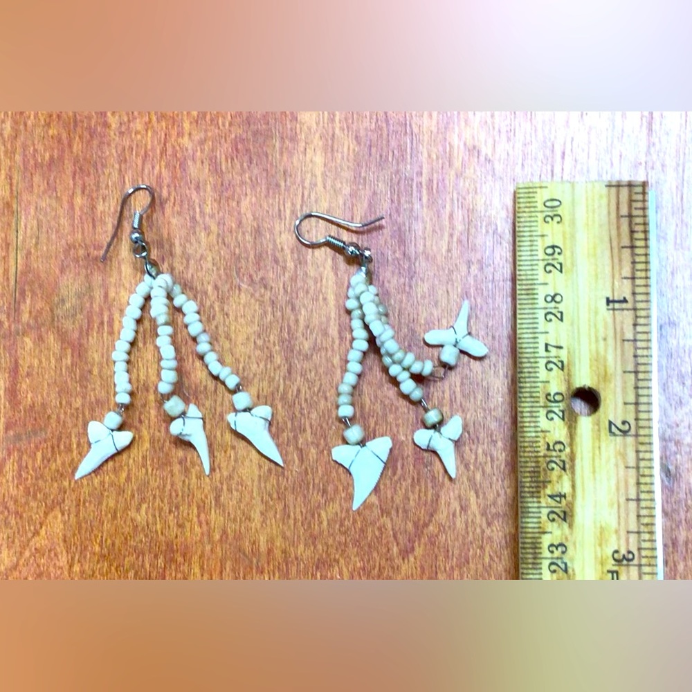 Shark tooth set of earrings.